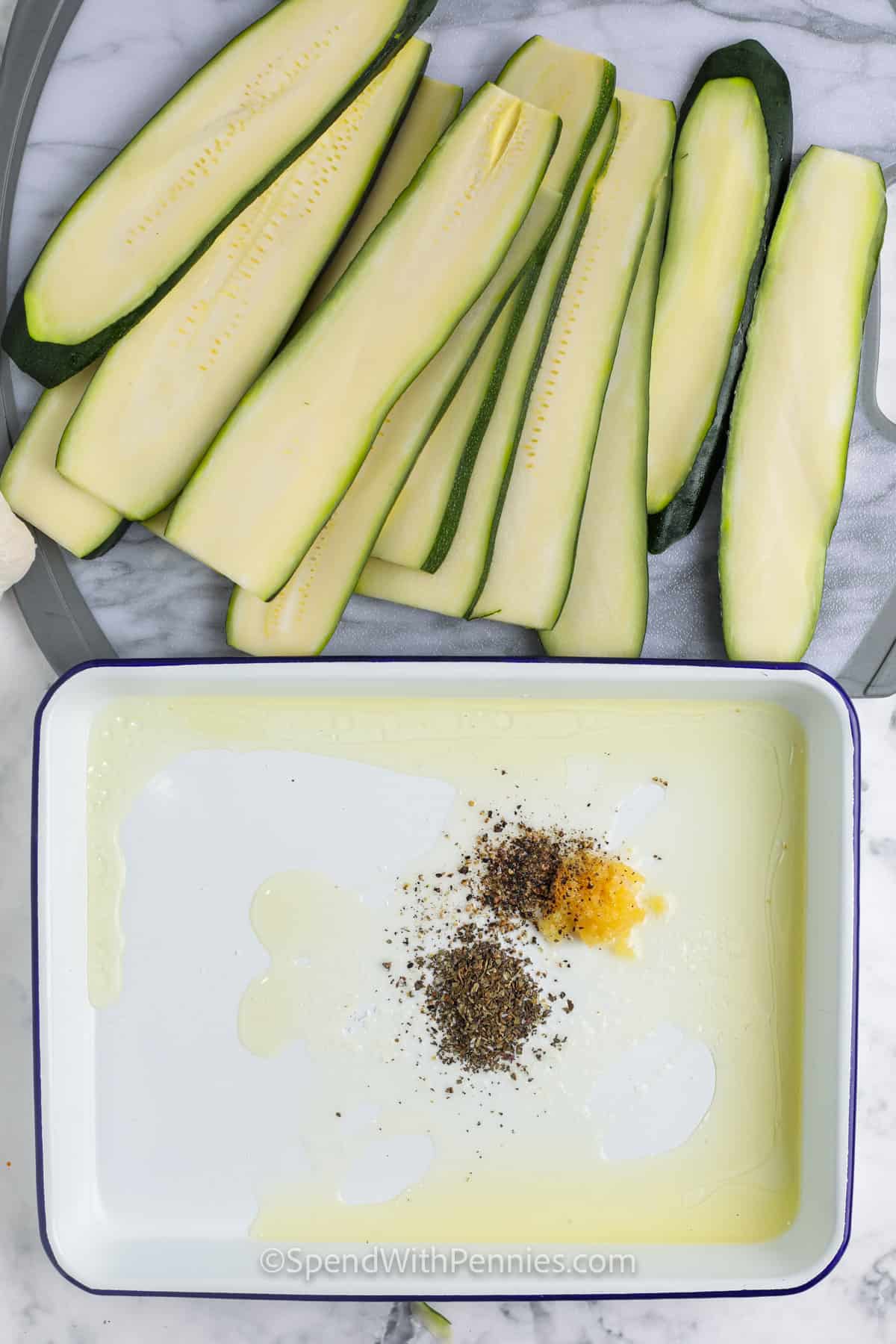 slices of zucchini and seasonings for grilled zucchini