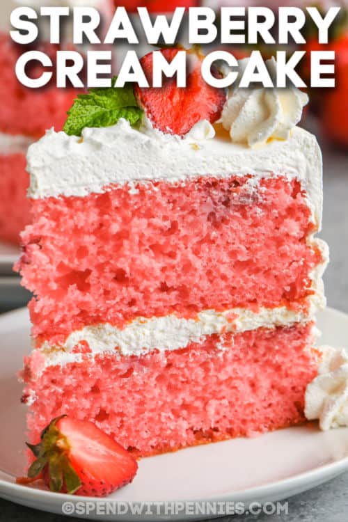 This strawberry cream cake is so tall, fluffy, moist, and sweet. It isn't hard to cook like a pro with this easy and decadent cake recipe. Jello and cake mix are the secret ingredients for the cake, while the cream cheese topping is enhanced with some pudding. The best dessert is homemade! #strawberrycreamcake #strawberrycreamcakerecipe #strawberrycake #spendwithpennies plated Strawberry Cream Cake slice with a title