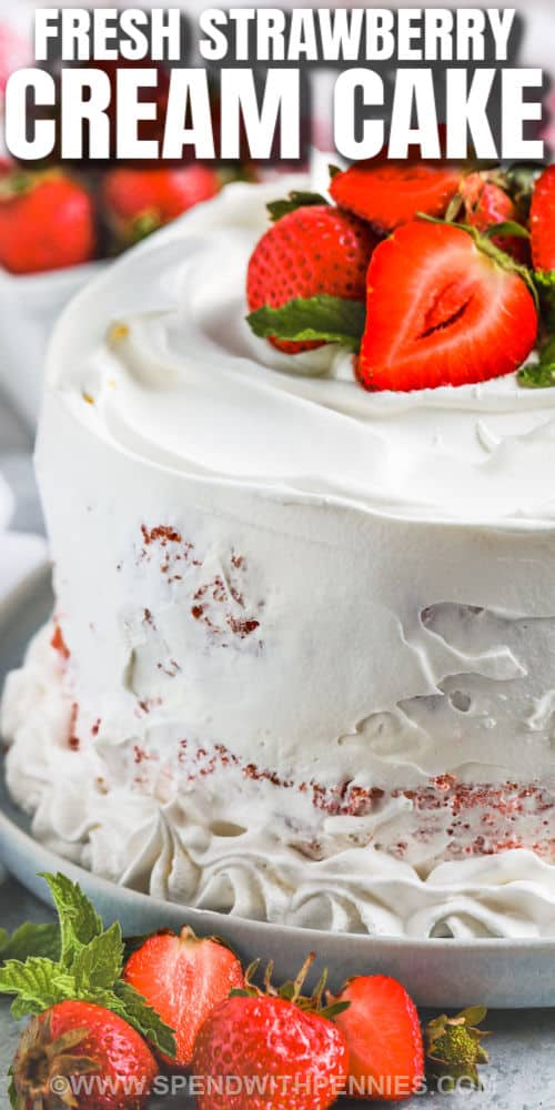 Strawberry Cream Cake with strawberries on top and writing