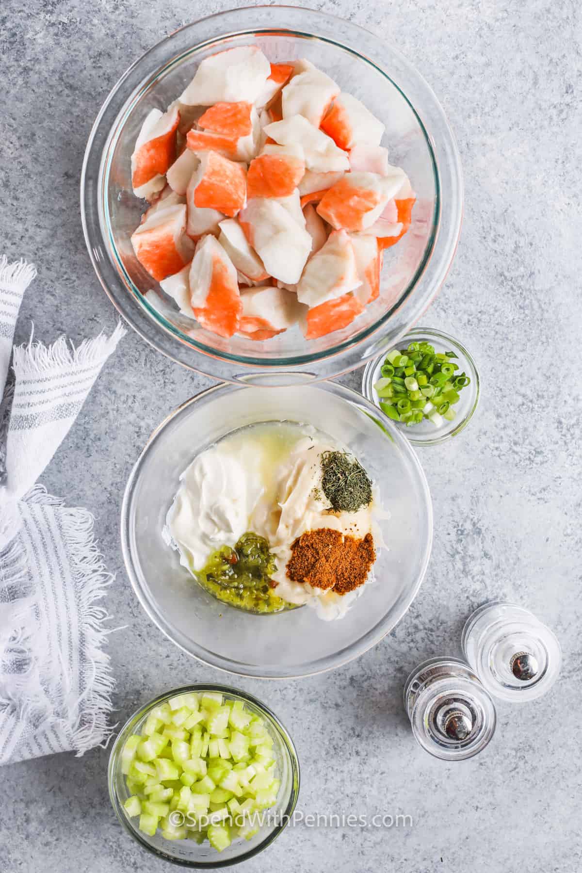 Try this easy crab salad recipe for a simple side dish or quick lunch. In this recipe, imitation crab meat is combined with some celery and a creamy dressing made from sour cream, mayo, and seasonings. It is the best eaten as is, added to a sandwich, or tossed with some pasta. To make it spicy, add a little cayenne or sriracha, or add some avocado or bell red pepper for more flavor and color. #crabsaladrecipe #crabsalad #easycrabsaladrecipe #spendwithpennies ingredients to make Crab Salad