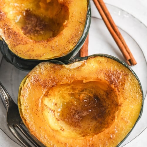 plated Microwave Acorn Squash with a cinnamon stick