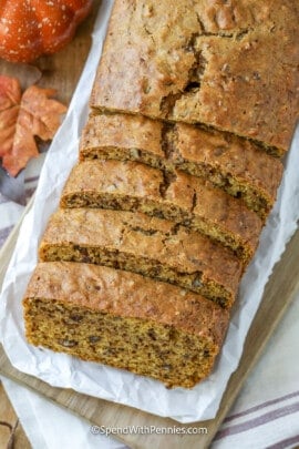 partially sliced loaf of pumpkin bread