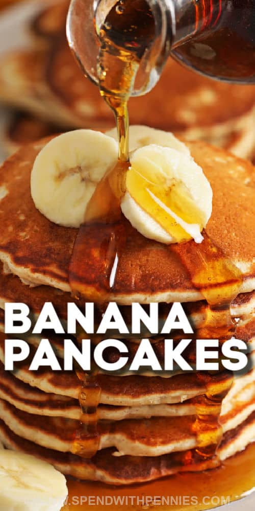 Put a new twist on classic pancakes with these banana pancakes. This recipe has all the classic ingredients for pancakes - butter, buttermilk, sugar, eggs, flour, and more. But the addition of bananas will make these little 'cakes' stand out from the typical recipe. It is also so easy to make these gluten free, by using your favorite gluten free flour. Top with some butter, maple syrup, and some chocolate chips for the final touch! #bananapancakes #bananapancakerecipe #bananapancakesrecipe #spendwithpennies pouring syrup over Banana Pancakes with a title