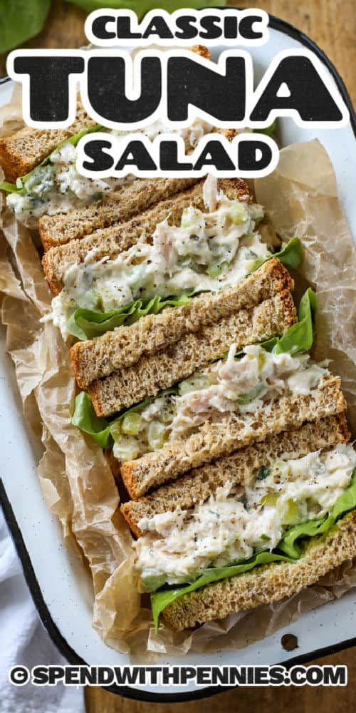 Tuna Salad sandwiches on a plate with writing