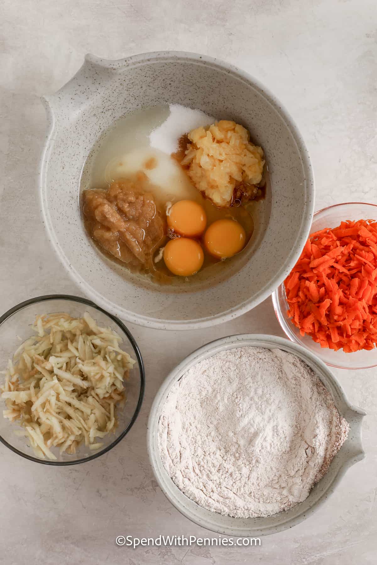 ingredients for morning glory muffins in separate bowls