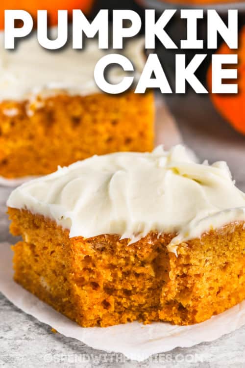 This pumpkin cake is a moist and soft cake that is full of Fall flavor. The recipe calls for all the basic ingredients for the cake, however, the addition of pumpkin pie spice and canned pumpkin brings it to a whole new level of flavor. Simply mix it together, and then bake in the oven. #pumpkincake #pumpkincakerecipe #cakewithpumpkin #spendwithpennies piece of Pumpkin Cake with a title