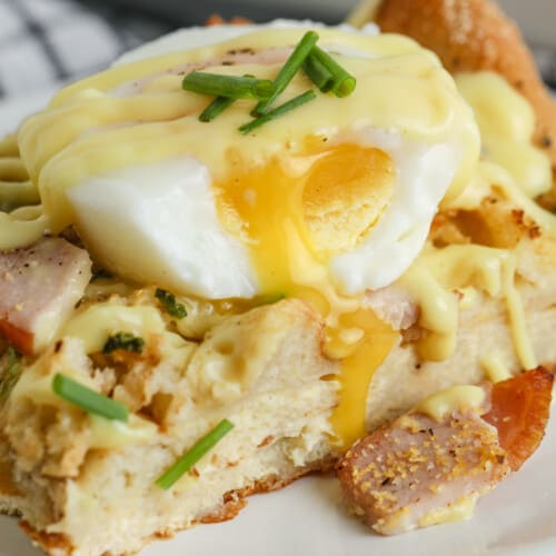 close up of a slice of Eggs Benedict Casserole on a plate