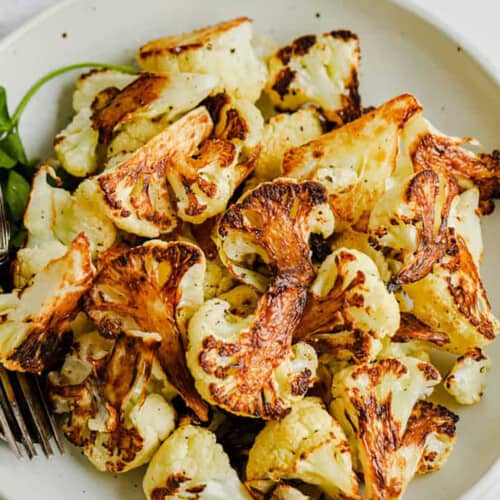 The Best Crispy Roasted Cauliflower on a plate