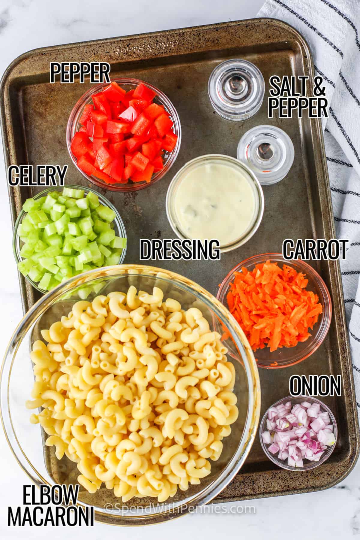 Macaroni, Celery, Pepper , Dressing , Carrot , Onion and salt and pepper to make Classic Macaroni Salad with labels