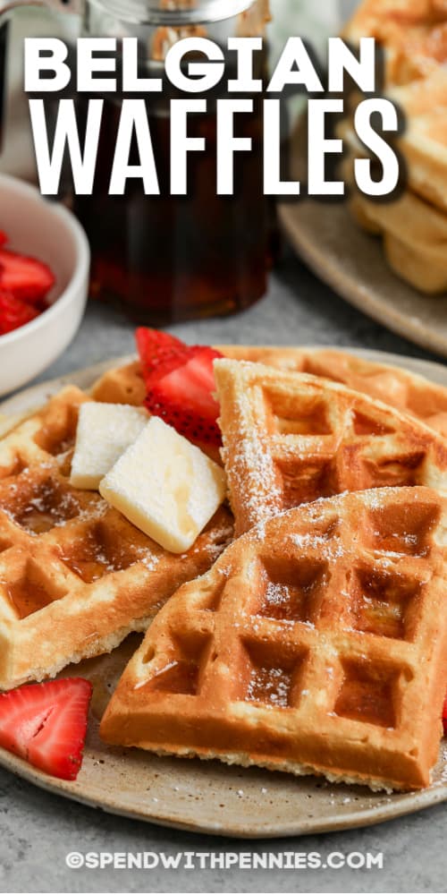 Delight the family or guests with this special Belgian waffle recipe. They are easy enough for every day, and always a welcome treat for Sunday brunch or even as a dessert! Buttermilk and whipped egg whites make these waffles extra light and crispy, while egg yolks, melted butter, and a touch of sugar and vanilla give them a fragrant, fluffy richness. Top with whipped cream or chocolate sauce for a sweet treat! #easybelgianwafflerecipe #spendwithpennies #belgianwafflerecipe #bestbelgianwaffles plate of belgian waffles with text