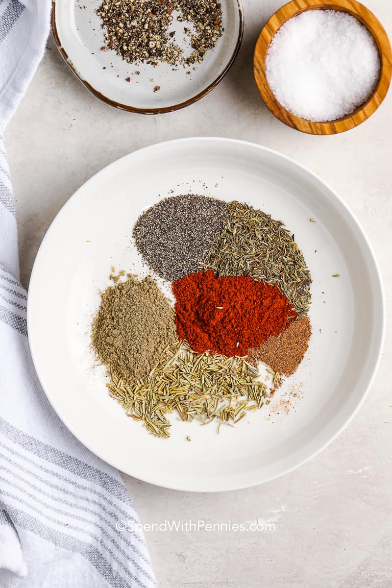 spices for homemade turkey seasoning on a plate