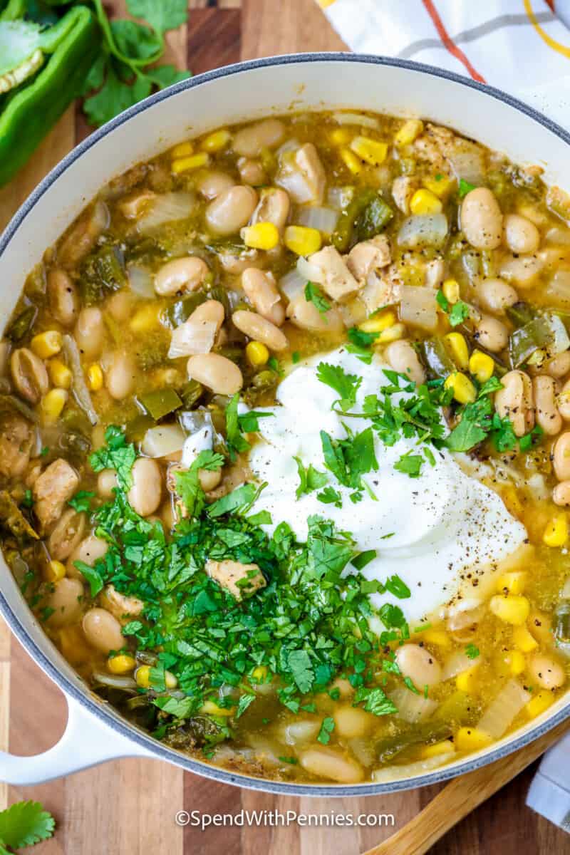 adding sour cream and cilantro to white chicken chili