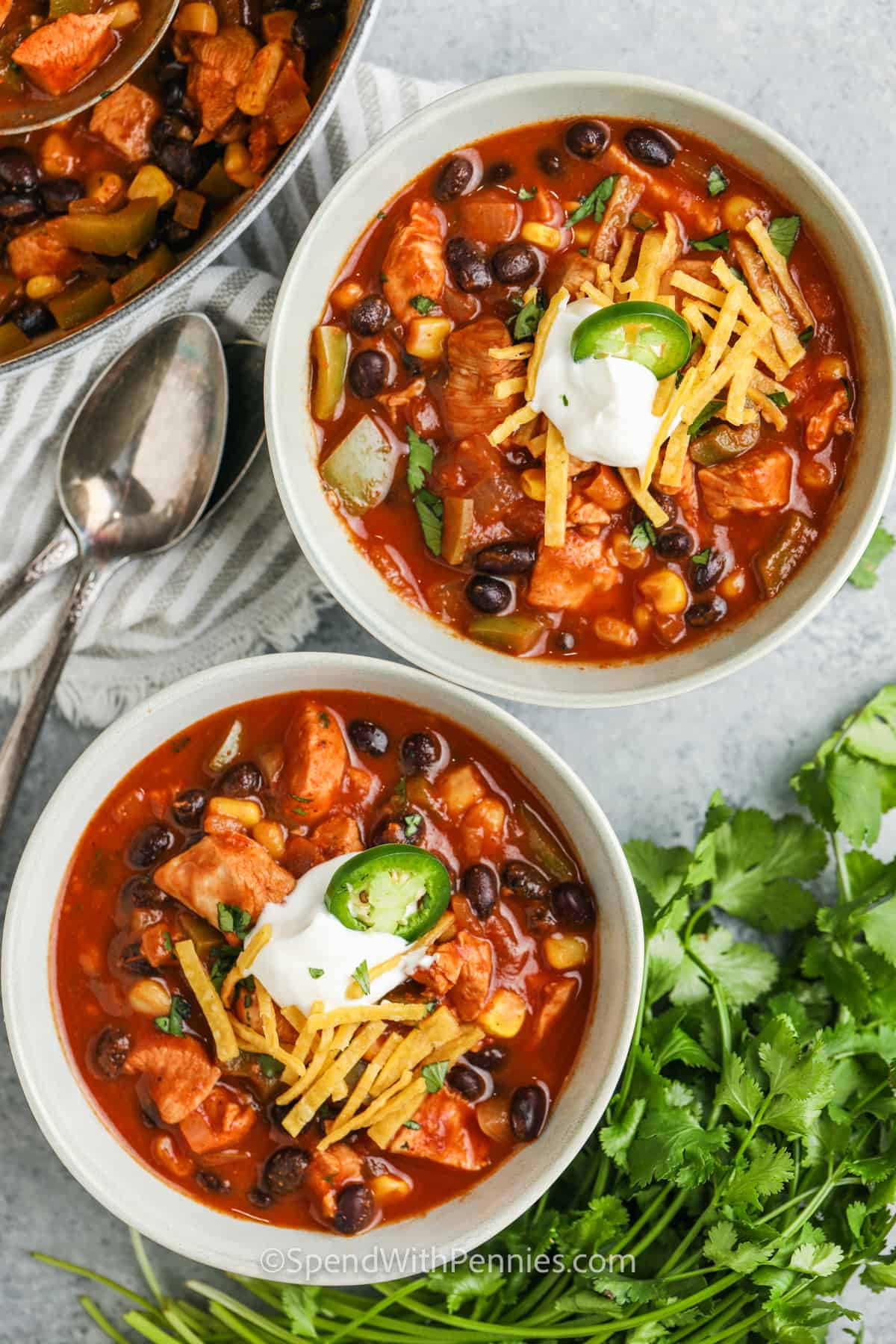 Chicken Taco Soup in bowls with sour cream