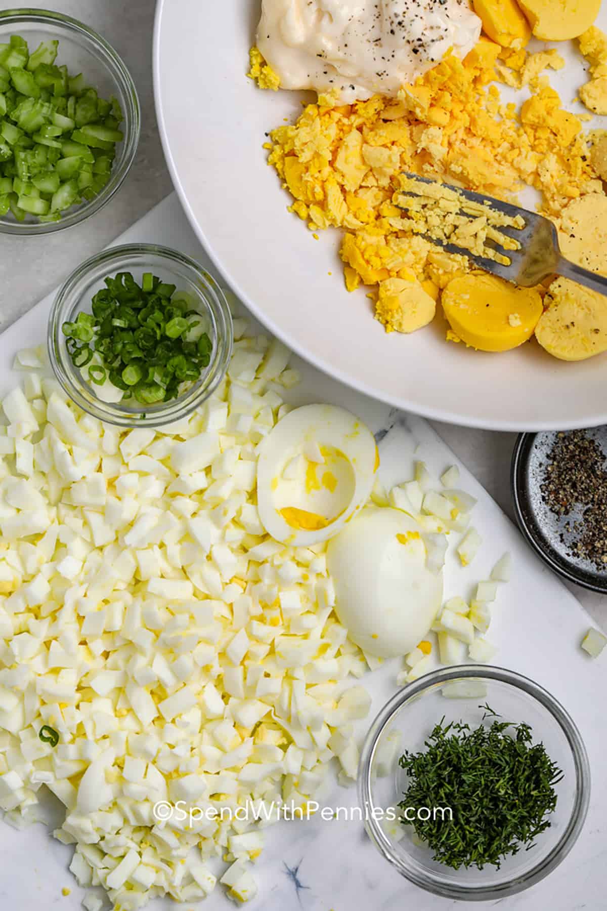 We love making this easy egg salad recipe as a light and flavorful lunch. Serve wrapped in lettuce or a low-carb wrap, or use fresh bread and make the best egg salad sandwich ever! With easy ingredients and only 20 minutes, this easy egg salad is ready to enjoy. #eggsalad #eggsaladsandwich #homemadeeggsalad #spendwithpennies ingredients to make Best Egg Salad Recipe