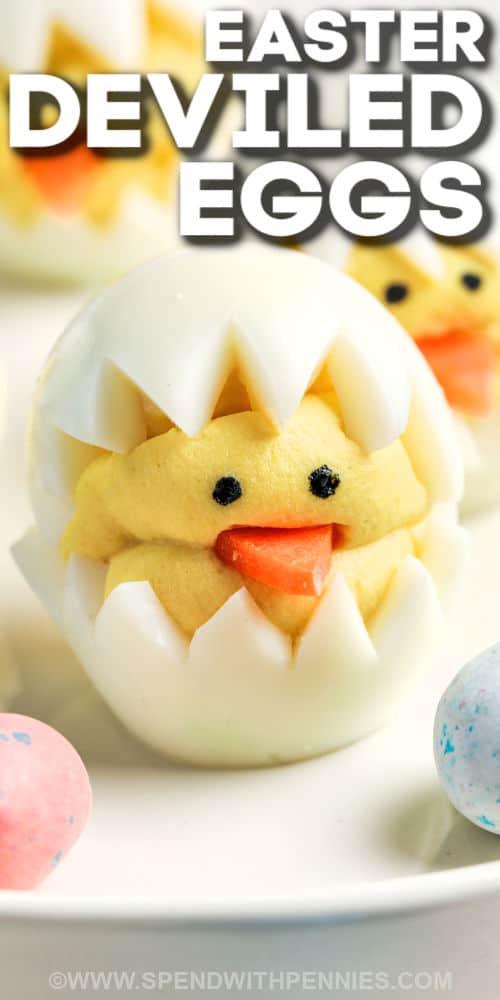 Deviled Egg Chicks are as fun to make as they are fun to eat! These cute little chicks are the perfect addition to any Easter dinner or celebration. Or, make them to celebrate Spring instead! #deviledeggchicks #deviledeggs #easter #spring #spendwithpennies finished Deviled Egg Chicks on a plate with a title