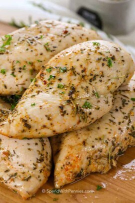 oven baked chicken breast on a cutting board