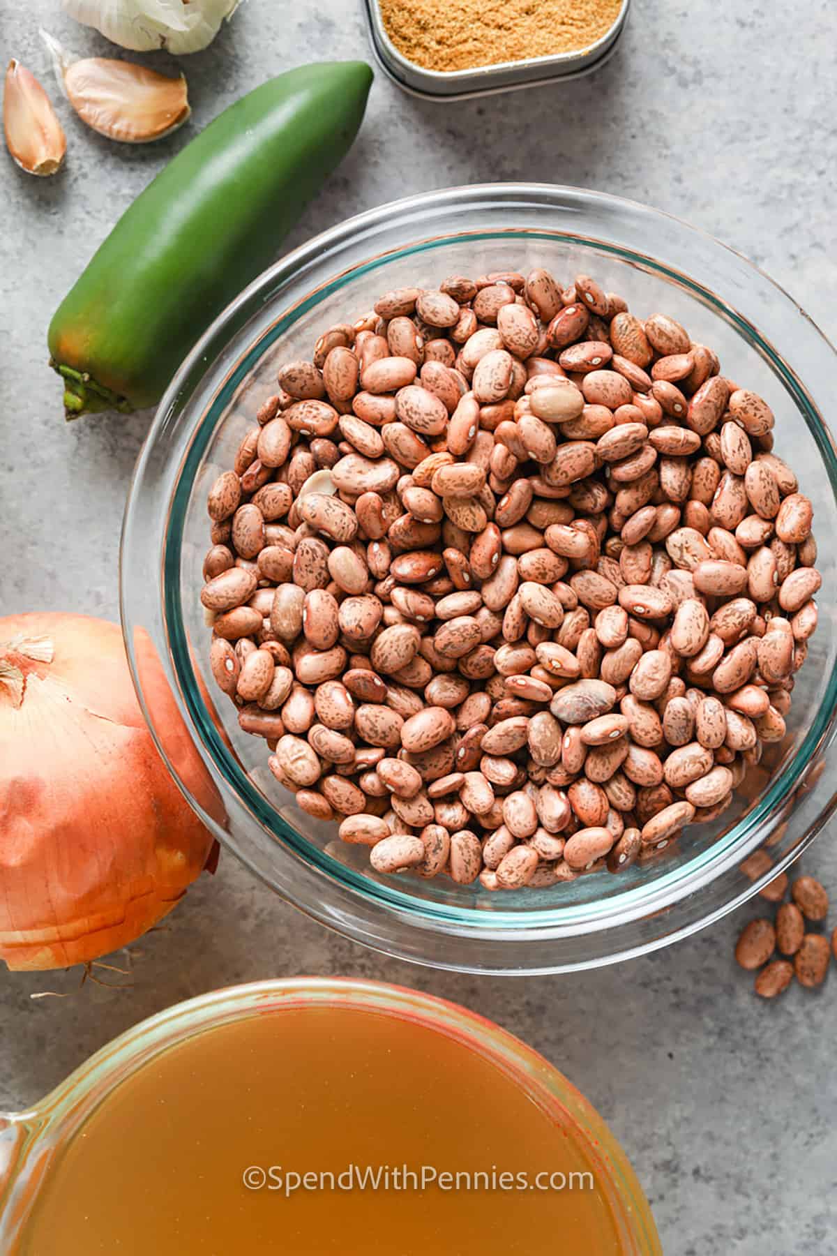 Slow cooker refried beans are perfect as a side to entrées like chicken or beef enchiladas, or even fish tacos. They are super easy to make and are easy on the budget too!
They are the best side dish, they're easily turned into a tasty bean dip, and they freeze and reheat well, too! "Refried" means the beans are cooked twice and mashed or even pureed with spices. #refriedbeans #homemadecrockpotrecipe #slowcookerrefriedbeans #spendwithpennies ingredients to make Homemade Refried Beans