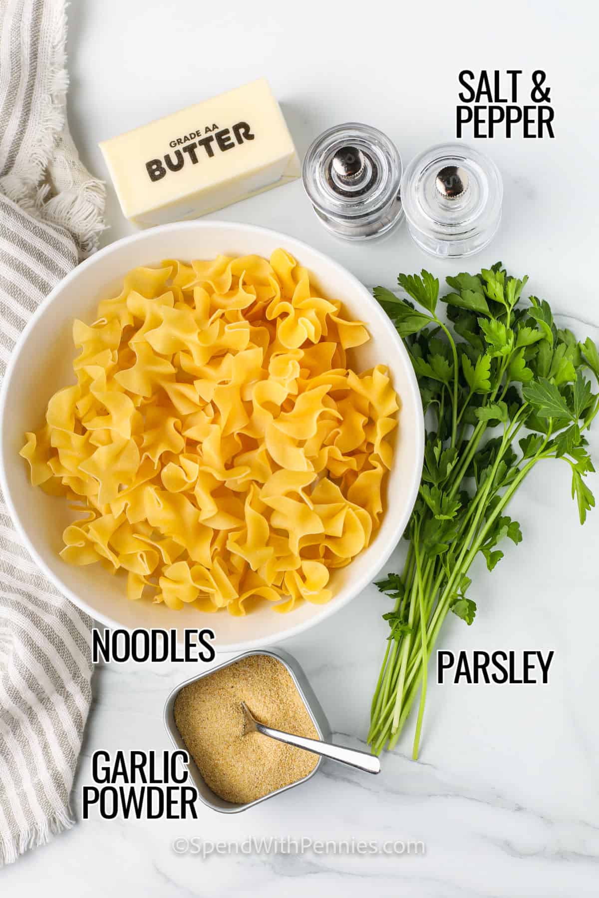 Buttered noodles are a plain and simple pasta favorite that’s anything but boring. This easy recipe coats tender egg noodles in butter with some easy seasonings, and tops it off with fresh parsley and a sprinkle of Parmesan. Perfect as a comfort food side or a side dish for a bigger meal, this stovetop classic is always a crowd-pleaser. #spendwithpennies noodles , butter , parsley , garlic powder, salt and pepper with labels to make Buttered Noodles