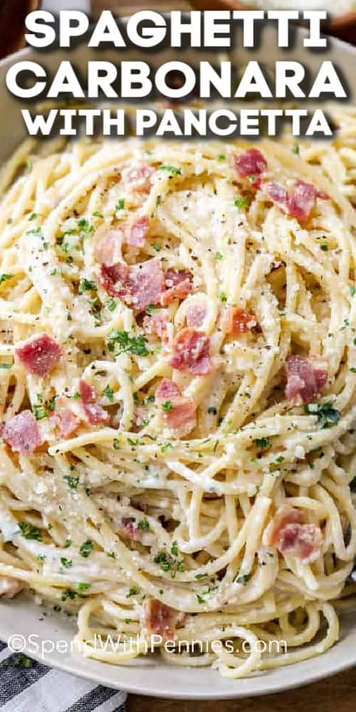 We love making this easy spaghetti carbonara recipe for a delicious Italian pasta dinner. It's great for date night or for a family get-together! Serve with a fresh side salad and some garlic bread for the perfect meal. #spendwithpennies Spaghetti Carbonara with pancetta in a bowl