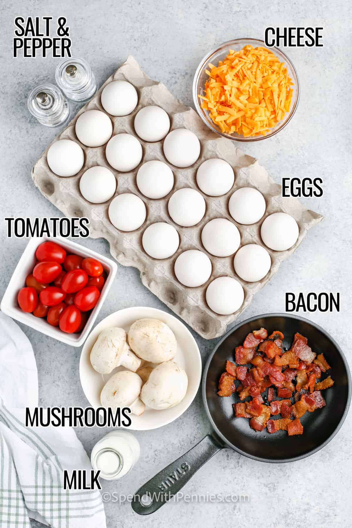 Make delicious sheet pan eggs with bacon, mushrooms, tomatoes, cheddar cheese, and more! Simply mix eggs with milk, salt, and pepper, then add bacon, mushrooms, tomatoes, and cheese on a baking sheet. Bake until eggs are fluffy and set, and enjoy this tasty and customizable breakfast. Top it off with some sliced green onions for extra flavor if you'd like! #sheetpaneggs #forbreakfastsandwiches #spendwithpennies #bakedeggsrecipe cheese , eggs , salt and pepper , tomatoes , bacon, mushrooms and milk with labels to make Sheet Pan Eggs