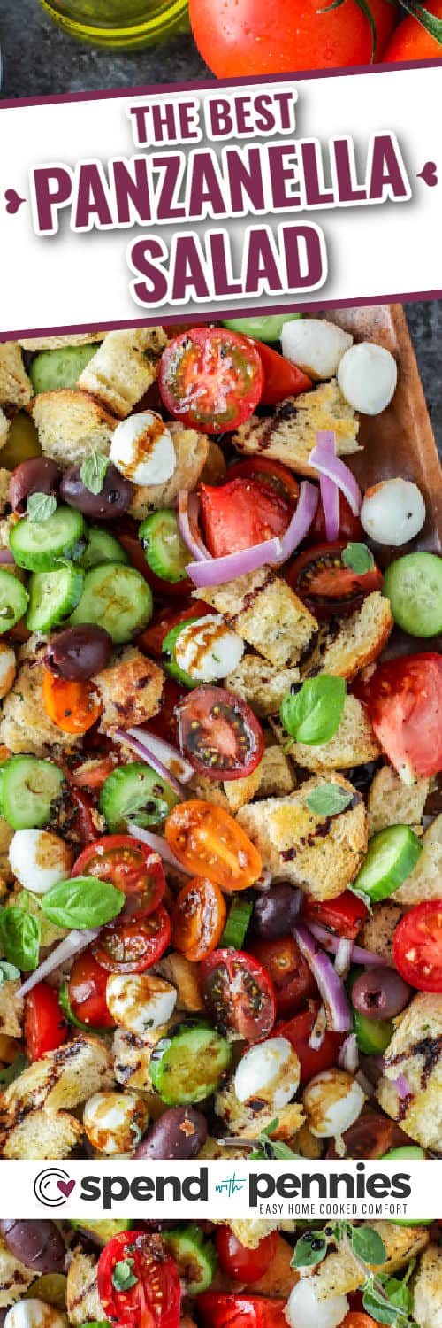 Panzanella salad is a classic mediterranean dish. I love the fresh flavors of tomatoes, cucumbers and mozzarella mixed with ciabatta bread and a tangy balsamic vinaigrette. It is the perfect light salad to serve in the summer! #panzanellasalad #salad #sidedish #summersalad #spendwithpennies wooden board with Easy Panzanella Salad and writing