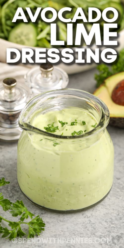 avocado lime dressing in a glass jar with text