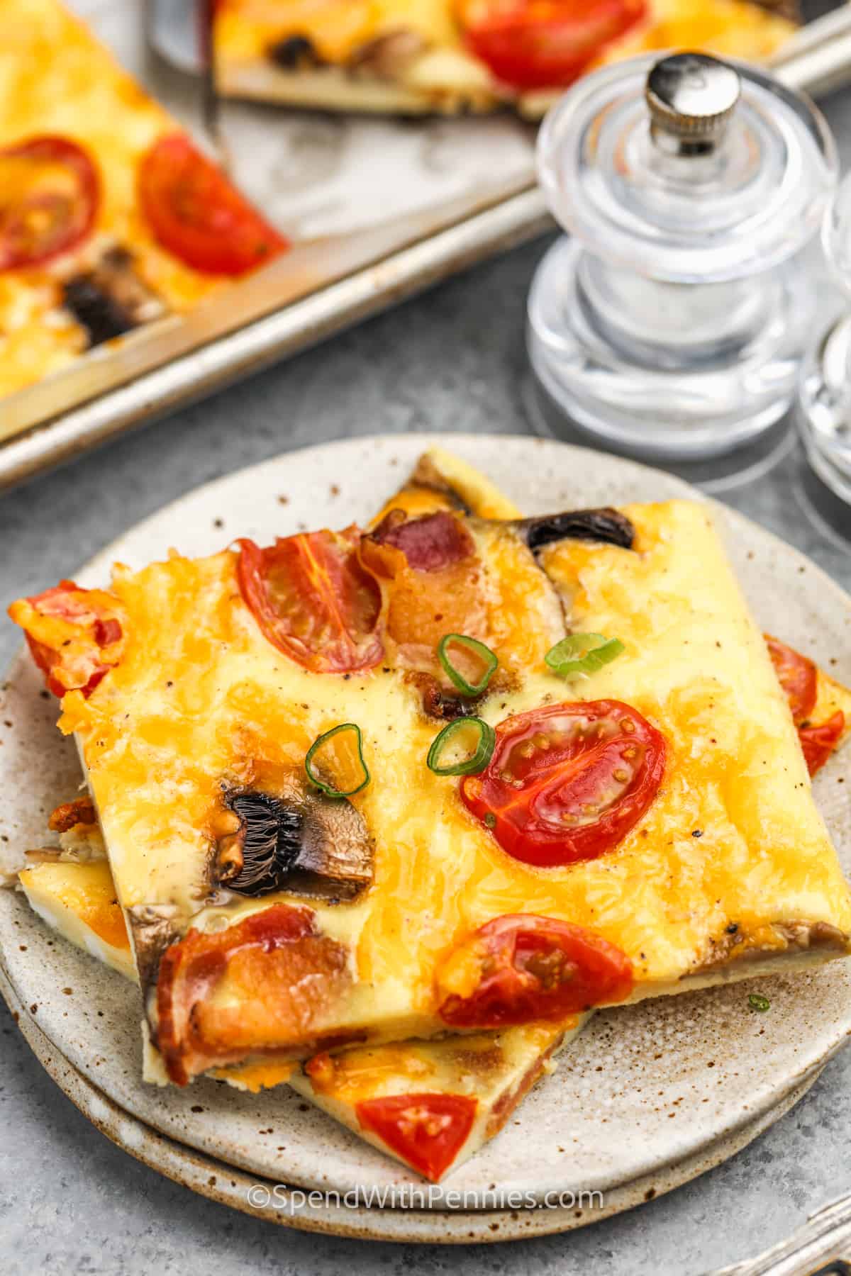 Sheet Pan Eggs slices on a plate