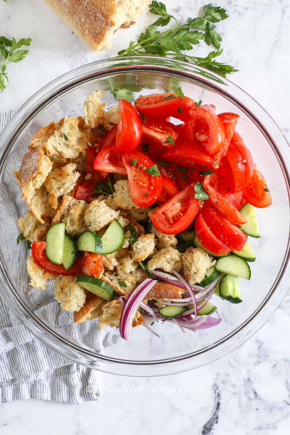 ingredients in a bowl for panzanella salad