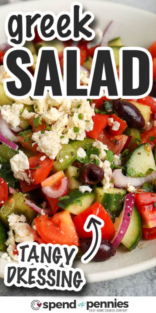 This Greek salad is an easy dish to make ahead for the next potluck, BBQ, or picnic. Roma tomatoes are tossed with cucumber, feta cheese, red onion, and a dressing made from lemon, olive oil, red wine vinegar, and seasonings. Feel free to add orzo or other pasta to stretch this dish even further. This just might be the best salad of the summer. So simple and oh-so-delicious! #greeksalad #salad #greekdressing #spendwithpennies Greek Salad with tangy dressing and a title