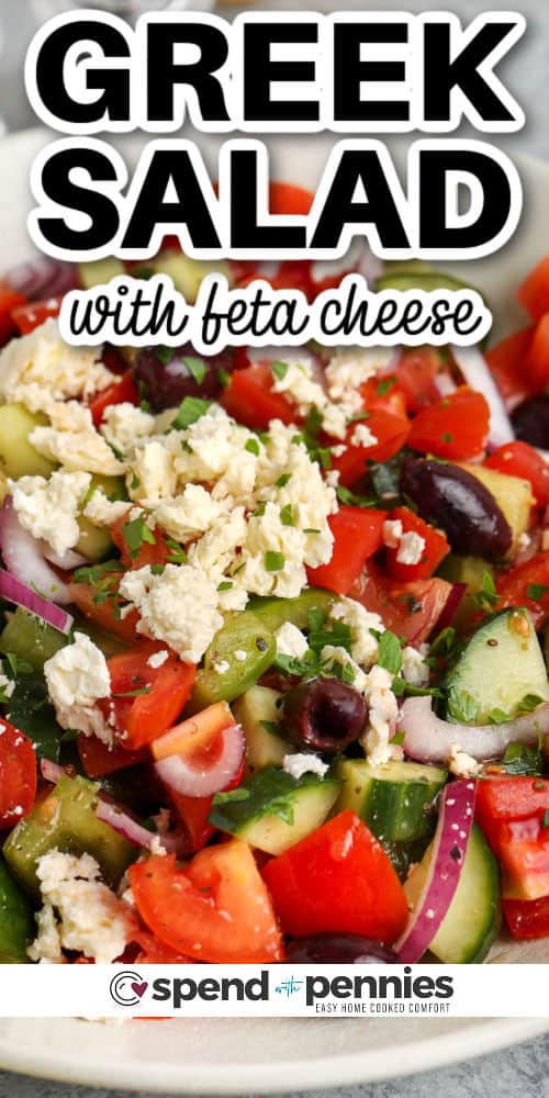 Make a simple and easy Greek salad that everyone will enjoy. This salad is made with easy-to-find ingredients like Roma tomatoes, cucumber, feta cheese, red onion, and a dressing made from lemon, olive oil, red wine vinegar, and seasonings. Sometimes the best side dishes are the ones that are simple and easy to make. #greeksalad #bestrecipe #dressingrecipe #spendwithpennies close up of Greek Salad with a title