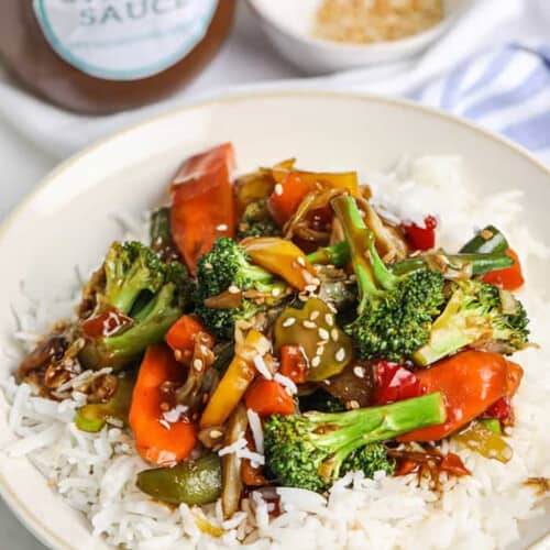 Stir fry sauce served over veggie and rice
