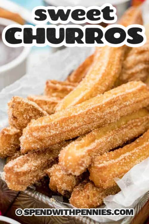 Homemade churros are golden, crispy pastries made from a simple dough, fried until perfectly golden, and coated in a sweet cinnamon-sugar mixture. With their crunchy exterior and soft, doughy interior, homemade churros are a delicious treat for anyone with a sweet tooth! #churros #homemade #recipe #mexican #spendwithpennies close up of Churros in a basket with a title