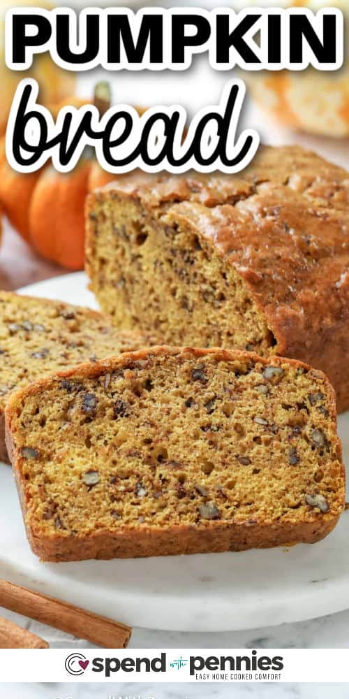 This pumpkin bread recipe will make a quick bread that is as good, even better than the local Starbucks or bakery. In this recipe, pumpkin puree is blended with some flour and pumpkin spice, plus eggs and other classic baking ingredients. Make an optional chocolate chip version. It is so easy to make, why waste time waiting in line when you can make it fresh and homemade? #pumpkinbread #homemade #recipe #spendwithpennies sliced Pumpkin Bread with a title