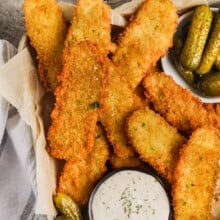 plated Crispy Fried Dill Pickles with dip