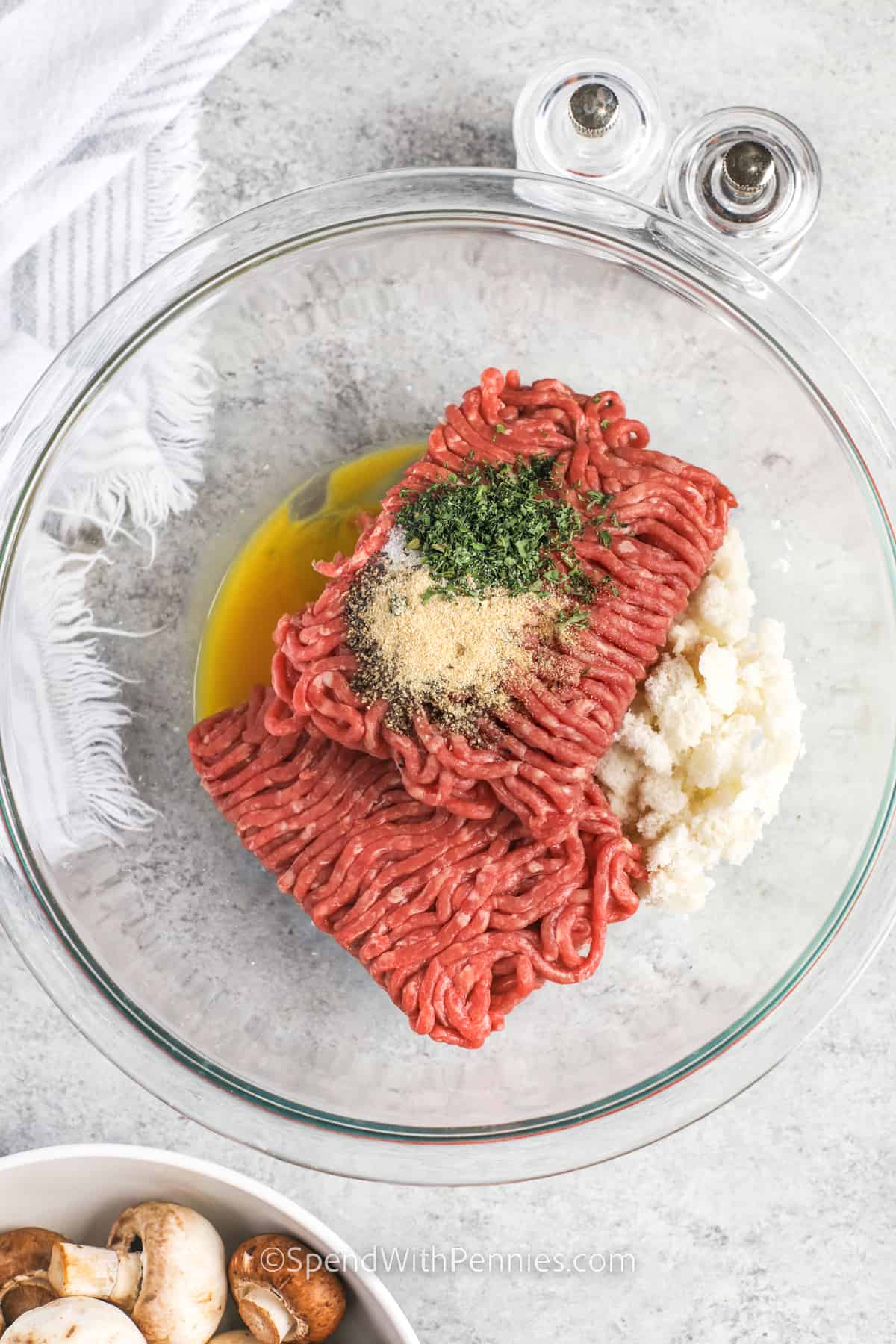 ingredients to make meatballs in a bowl