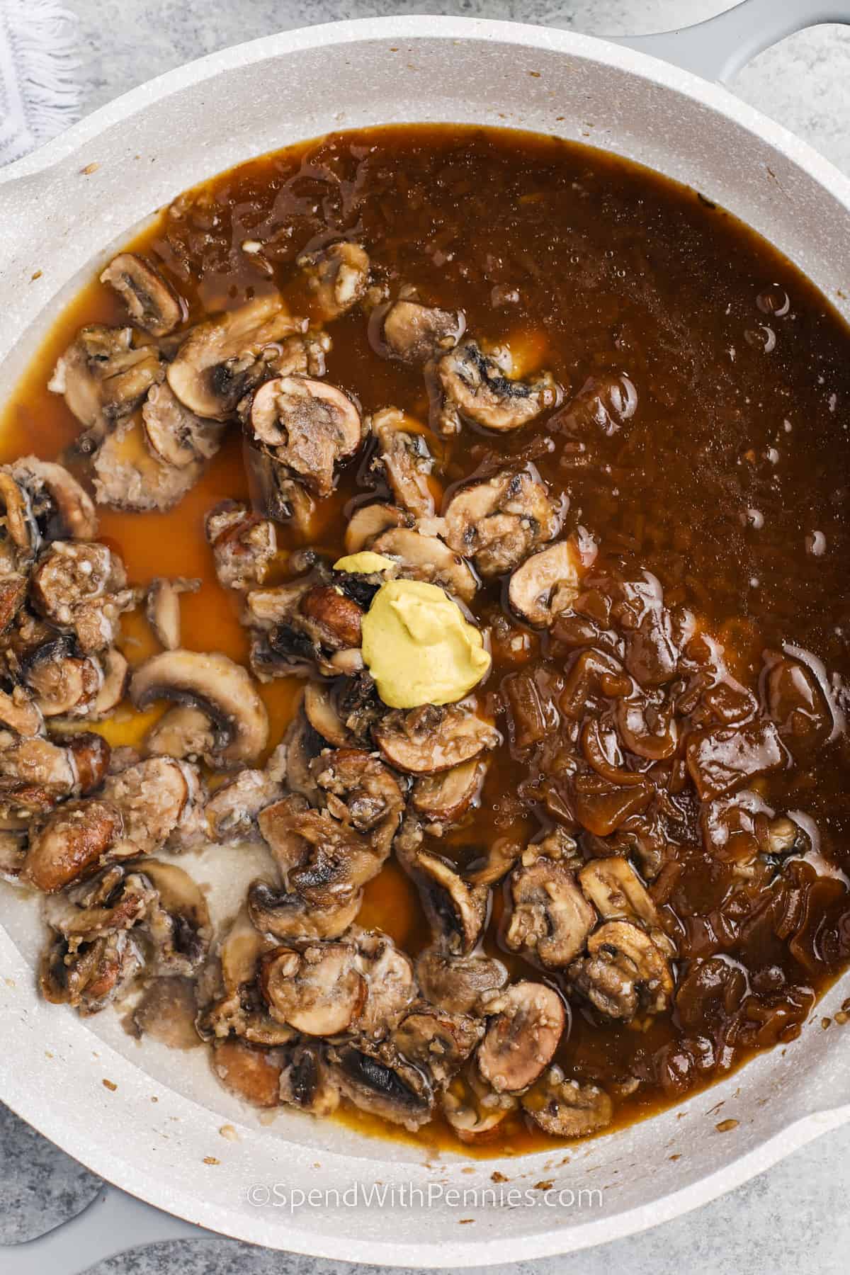 mushroom sauce prepped in a frying pan