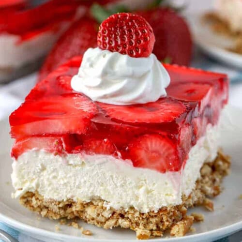 piece of Strawberry Pretzel Salad on a plate with a fork