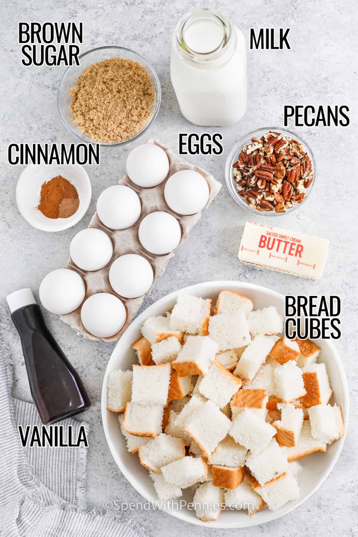 brown sugar , milk , pecans , eggs , cinnamon , bread , butter and vanilla with labels to make French Toast Casserole