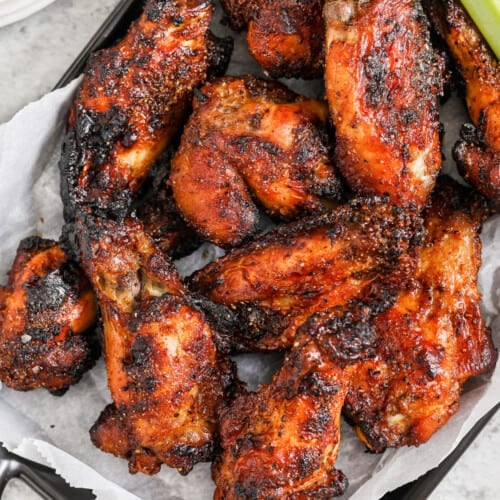 Dry Rub Chicken Wings on a plate with celery