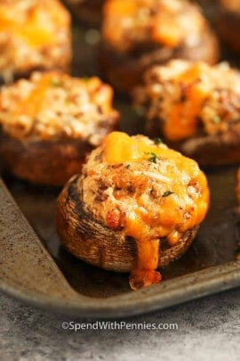 cheesy Sausage Stuffed Mushrooms on a sheet pan