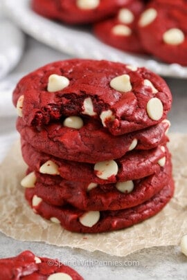 pile of Red Velvet Cake Mix Cookies with a bite taken out