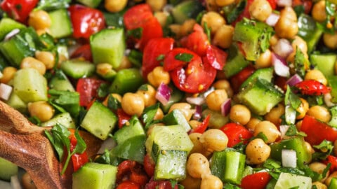 taking a spoonfull of Chickpea Salad