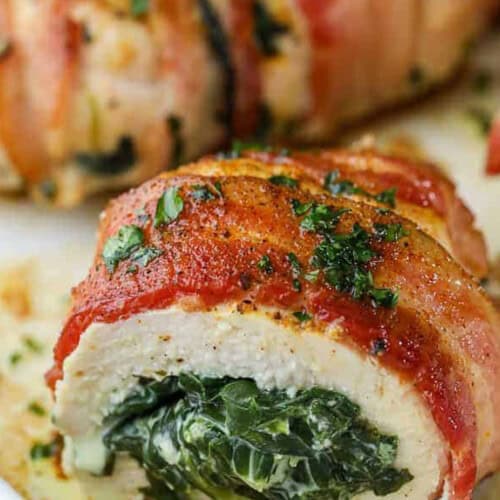 spinach stuffed chicken breasts in a dish