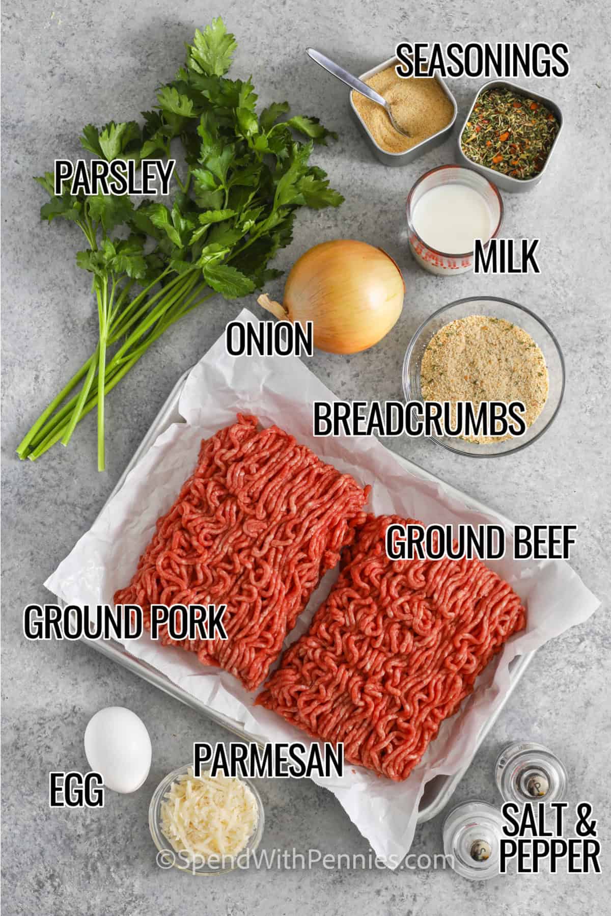 Ingredients to make meatballs labelled: parsley, seasoning, milk, onion, breadcrumbs, ground pork, ground beef, egg, parmesan, and salt & pepper