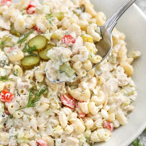 taking a spoonfull of Tuna Macaroni Salad