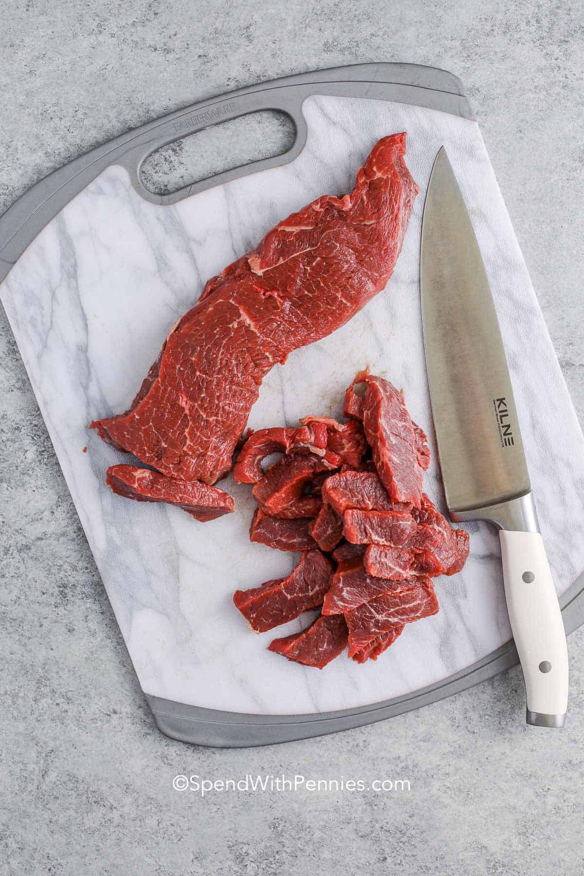 Cutting strips of beef for beef stroganoff
