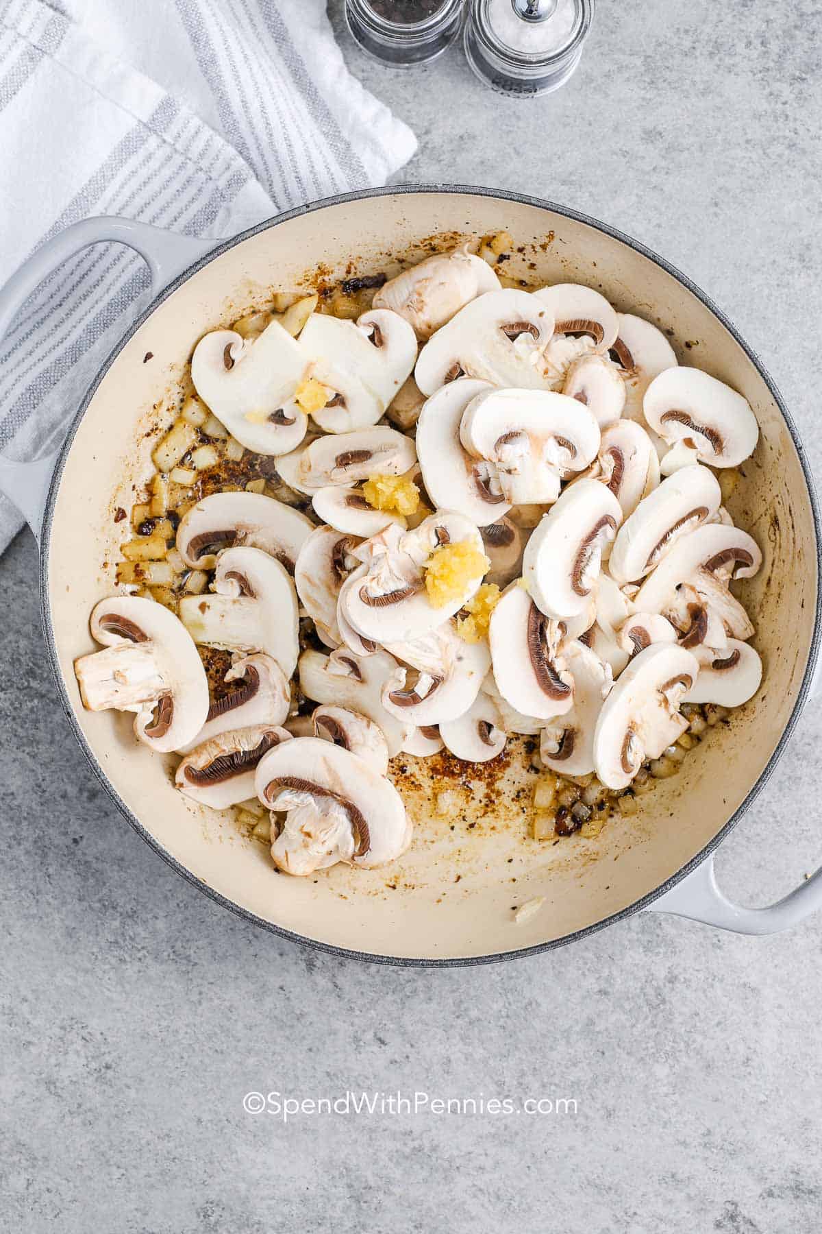 Mushrooms and garlic in a pot for beef stroganoff