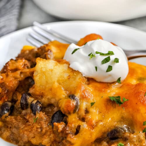 plated Cowboy Casserole with sour cream
