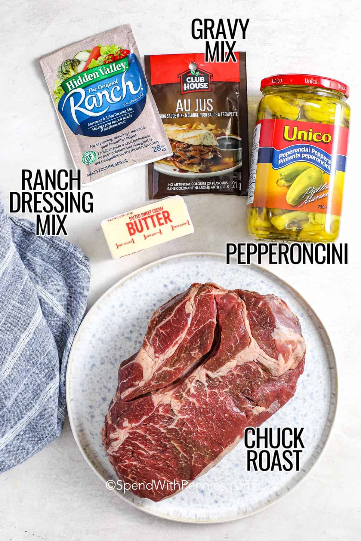chuck roast , pepperoncini , butter , gravy mix , ranch dressing mix with labels to make Mississippi Pot Roast