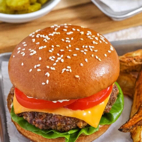 close up of Air Fryer Cheeseburgers with Crispy Potato Wedges